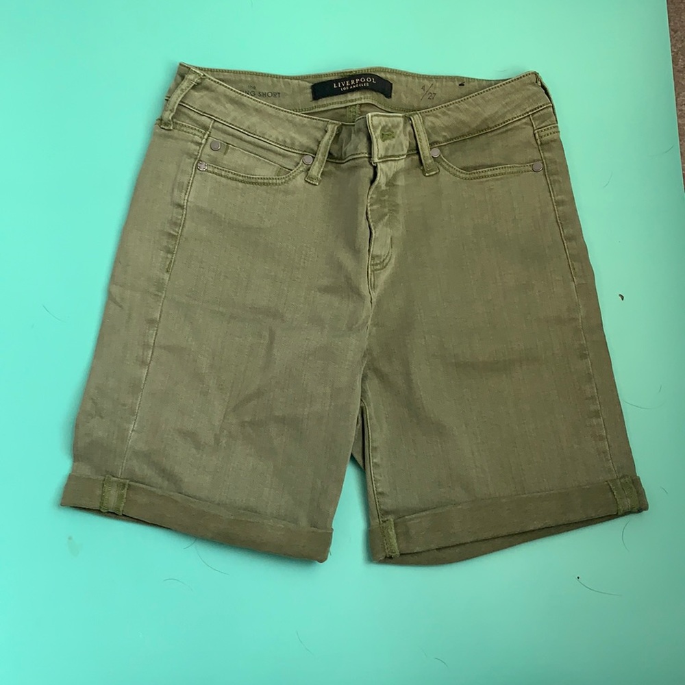 green jean shorts
